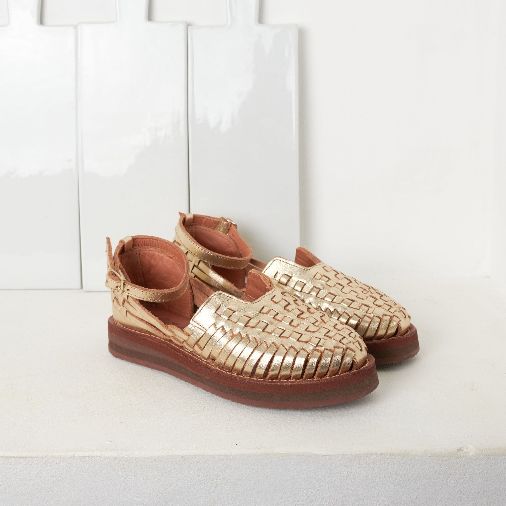 Carmen Champagne - Huarache Mapache