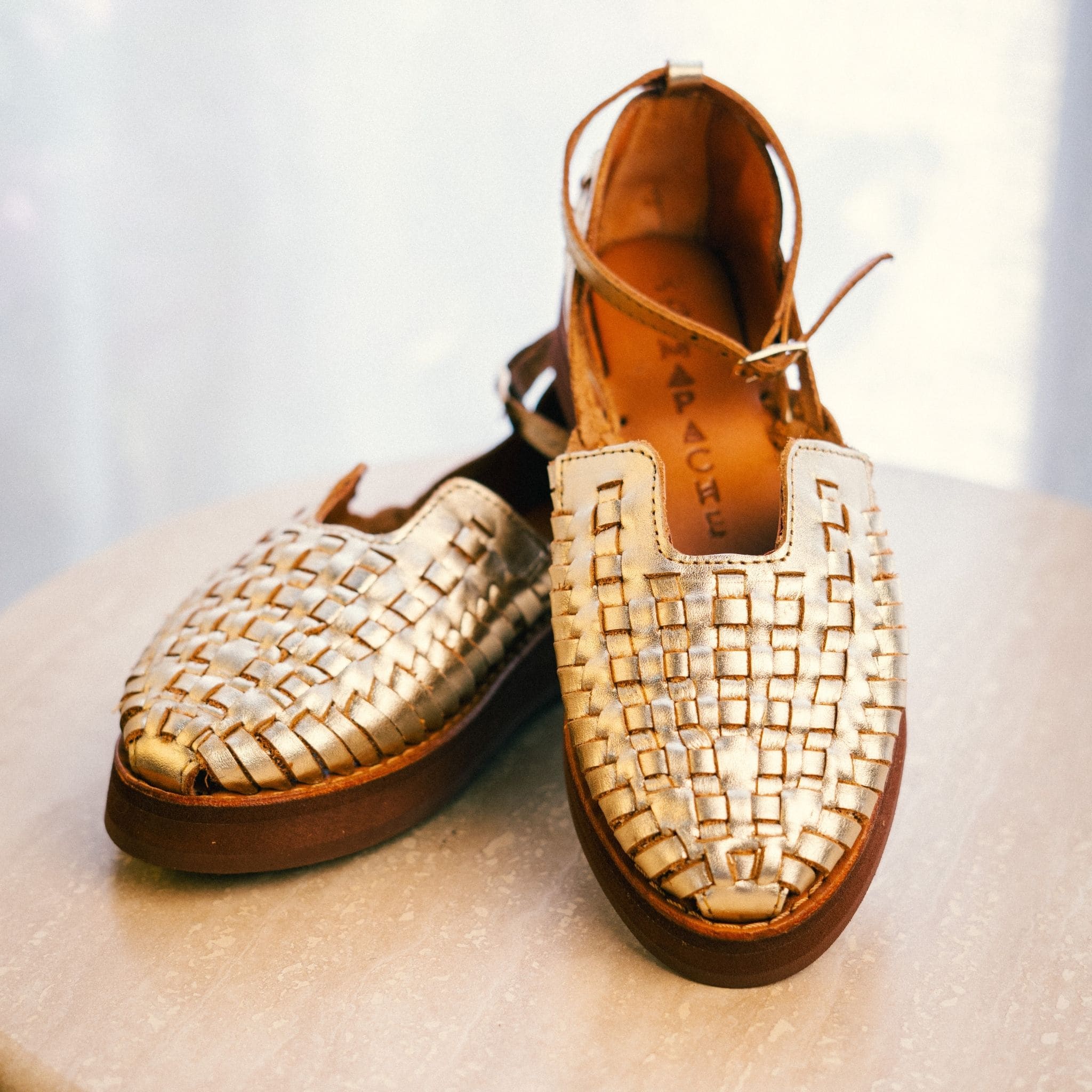 Carmen Champagne - Huarache Mapache